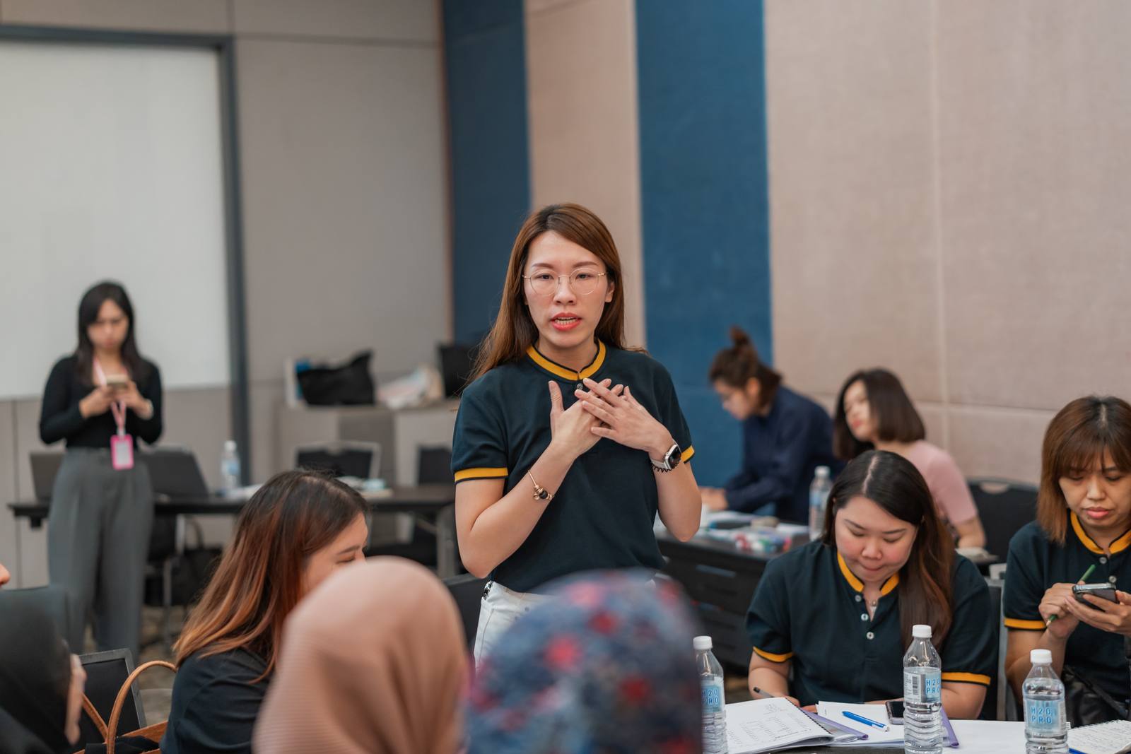 Managers in discussion during AZEO leadership training in Malaysia