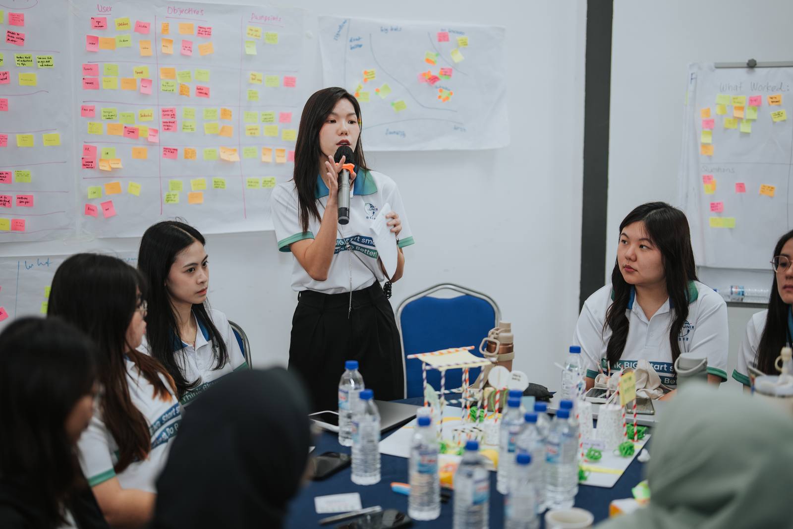 Participants working together during an AZEO corporate training programme in Malaysia